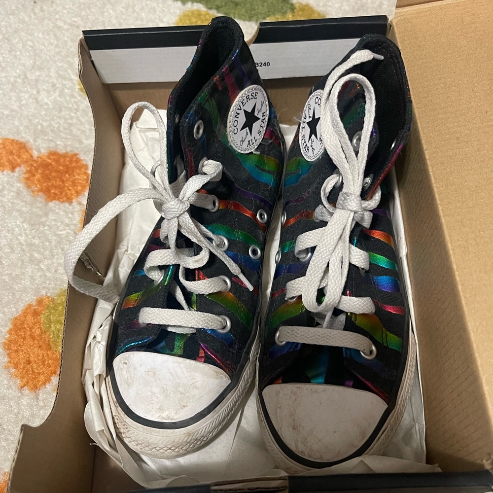 Converse high top tennis shoe